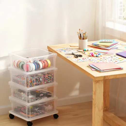 Drawer cart beside a craft desk