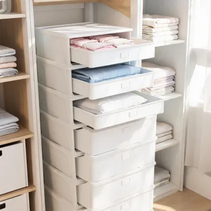 White drawer organizer tower in a bedroom closet